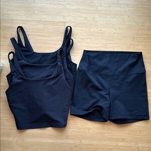 Black size large sports bras and size large biker shorts